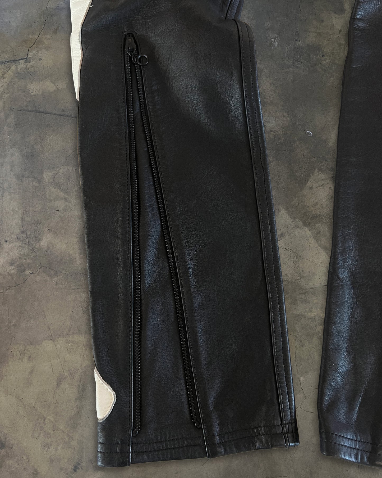 BLACKMEANS LEATHER BONE PANTS