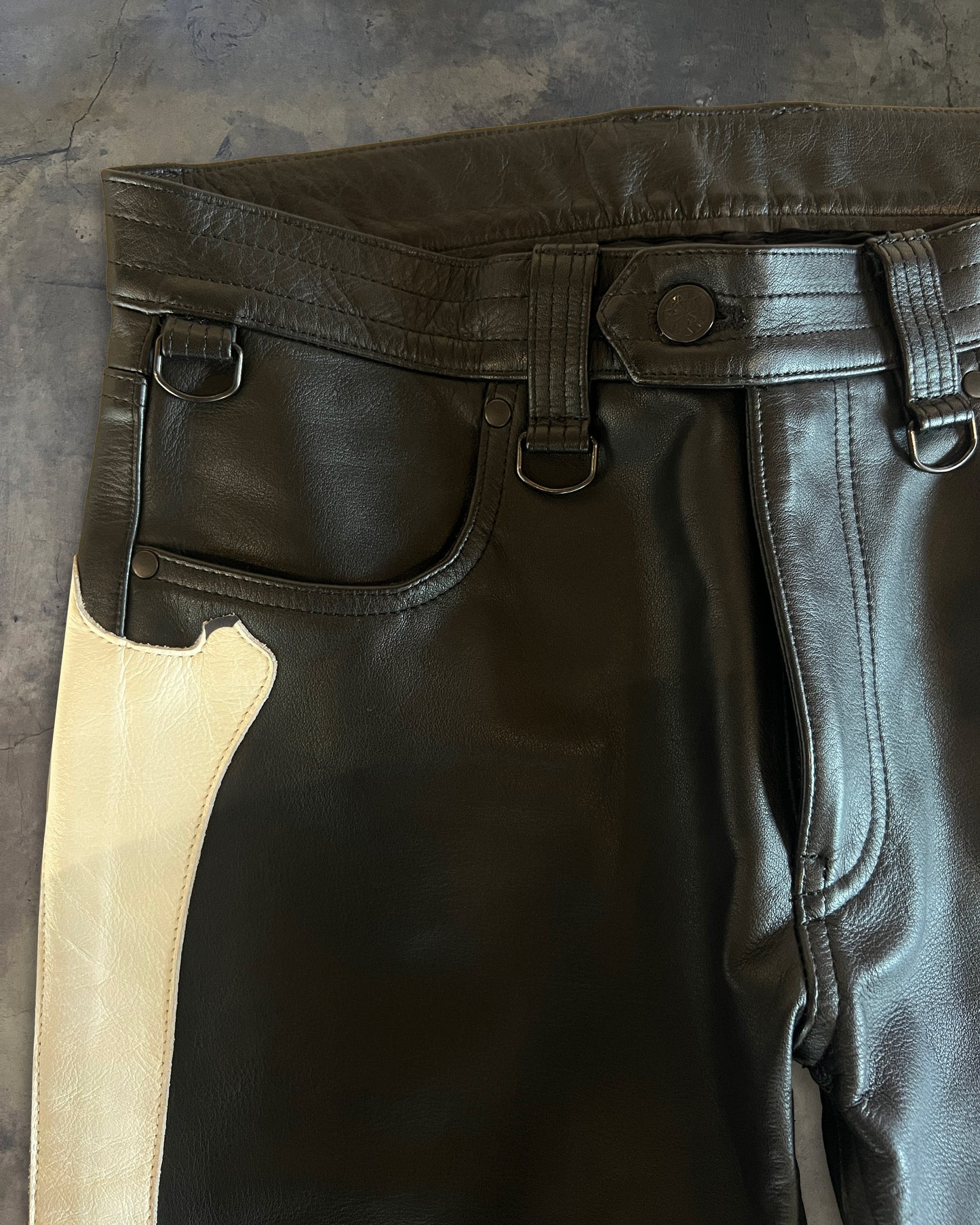BLACKMEANS LEATHER BONE PANTS