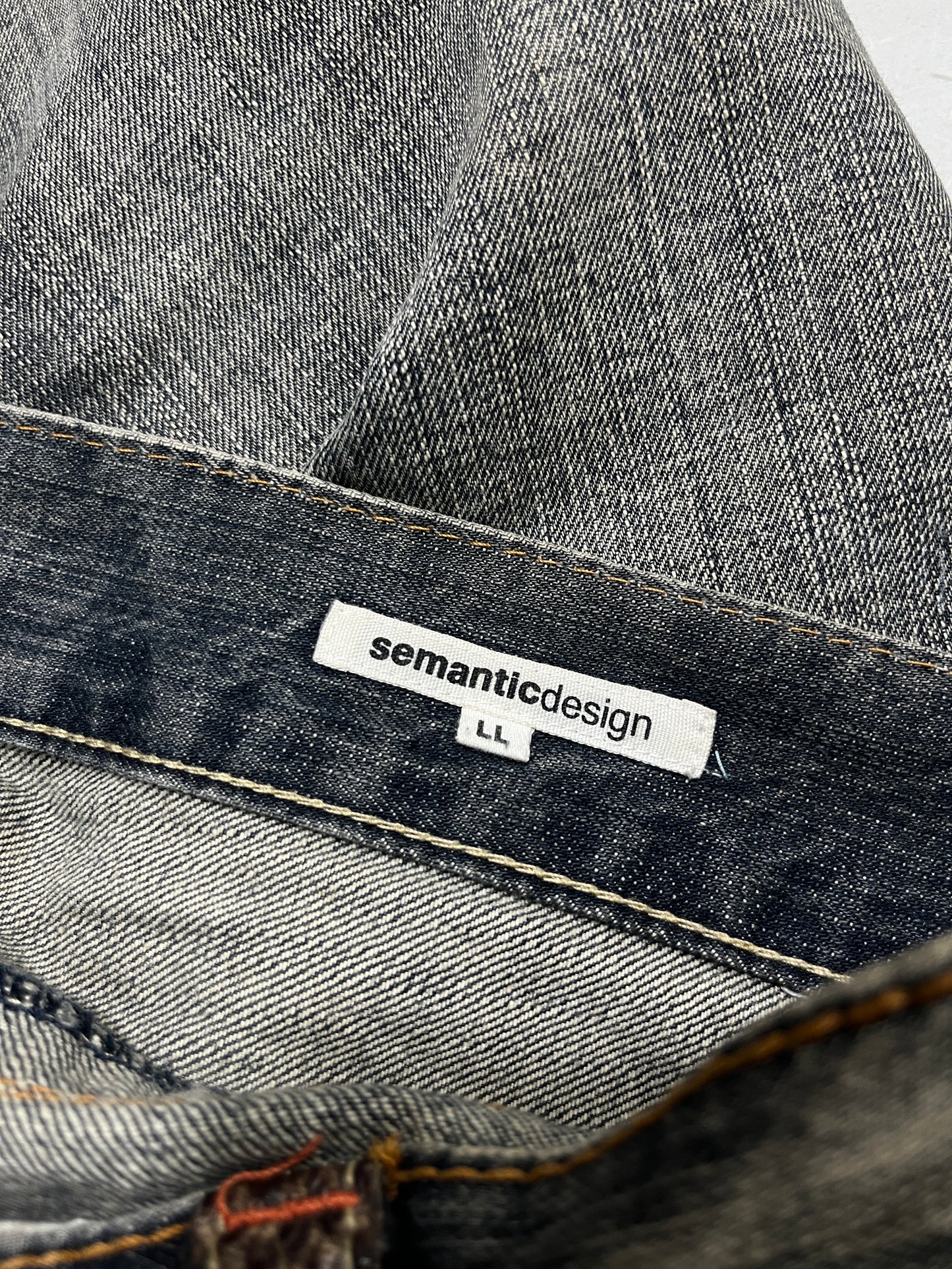 SEMANTIC DESIGN SNAKESKIN DENIM