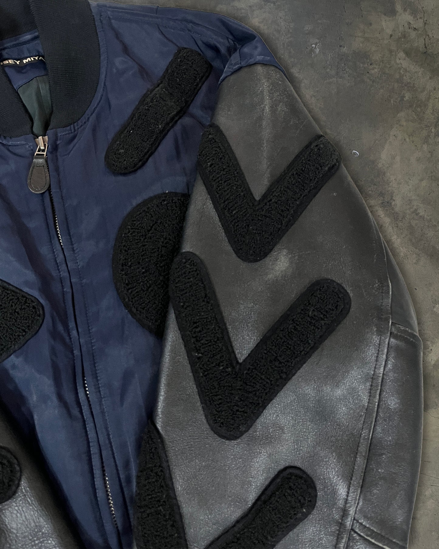 ISSEY MIYAKE SS1994 HYBRID BOMBER WITH PATCH APPLIQUE DETAILING