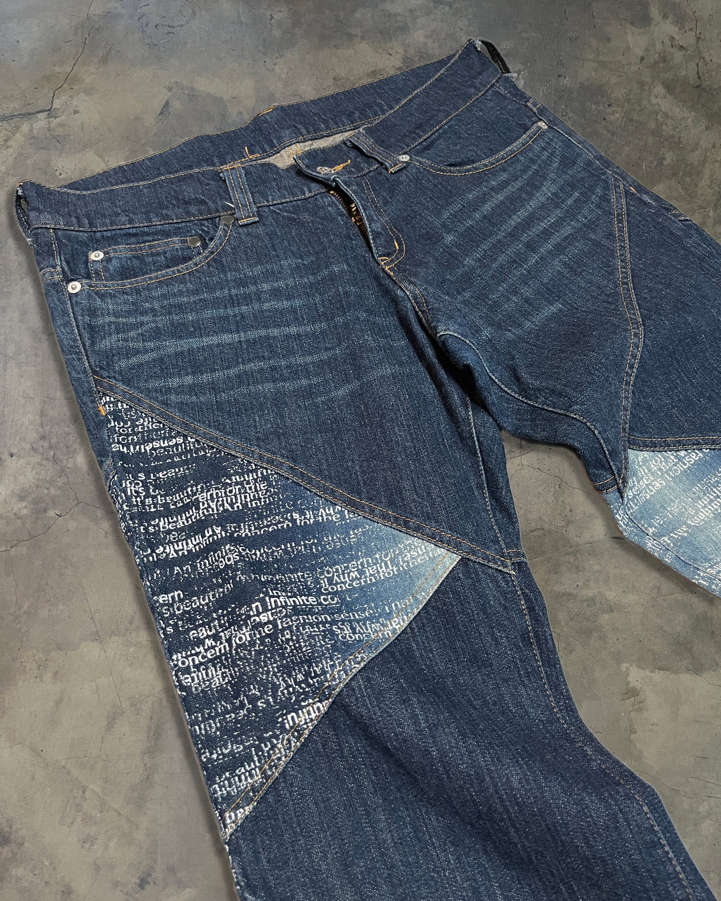 TORNADO MART PANELLED POEM JEANS