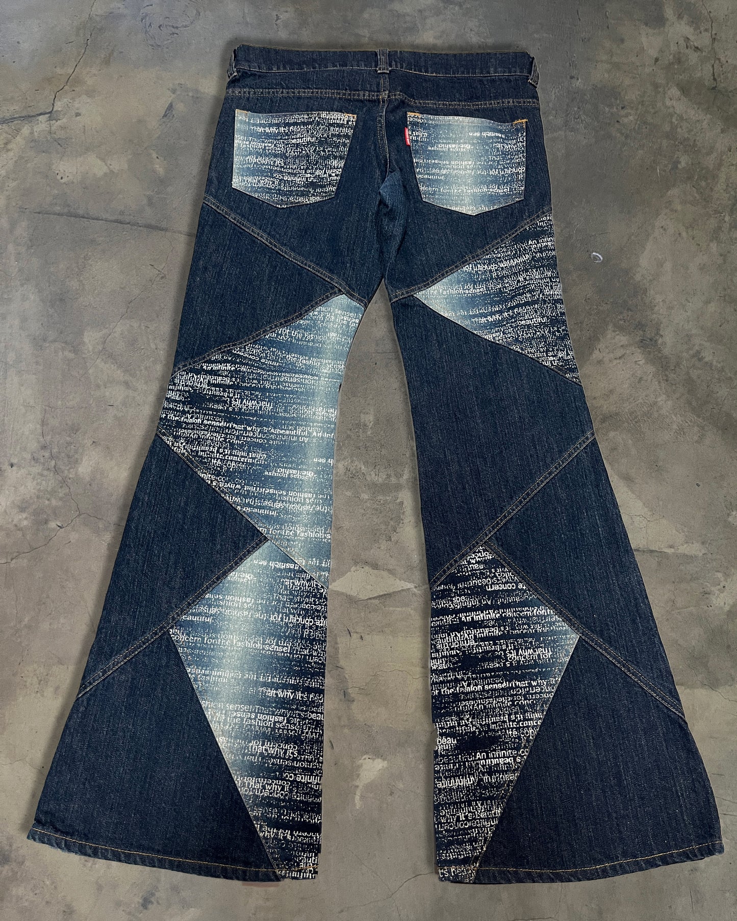 TORNADO MART PANELLED POEM JEANS