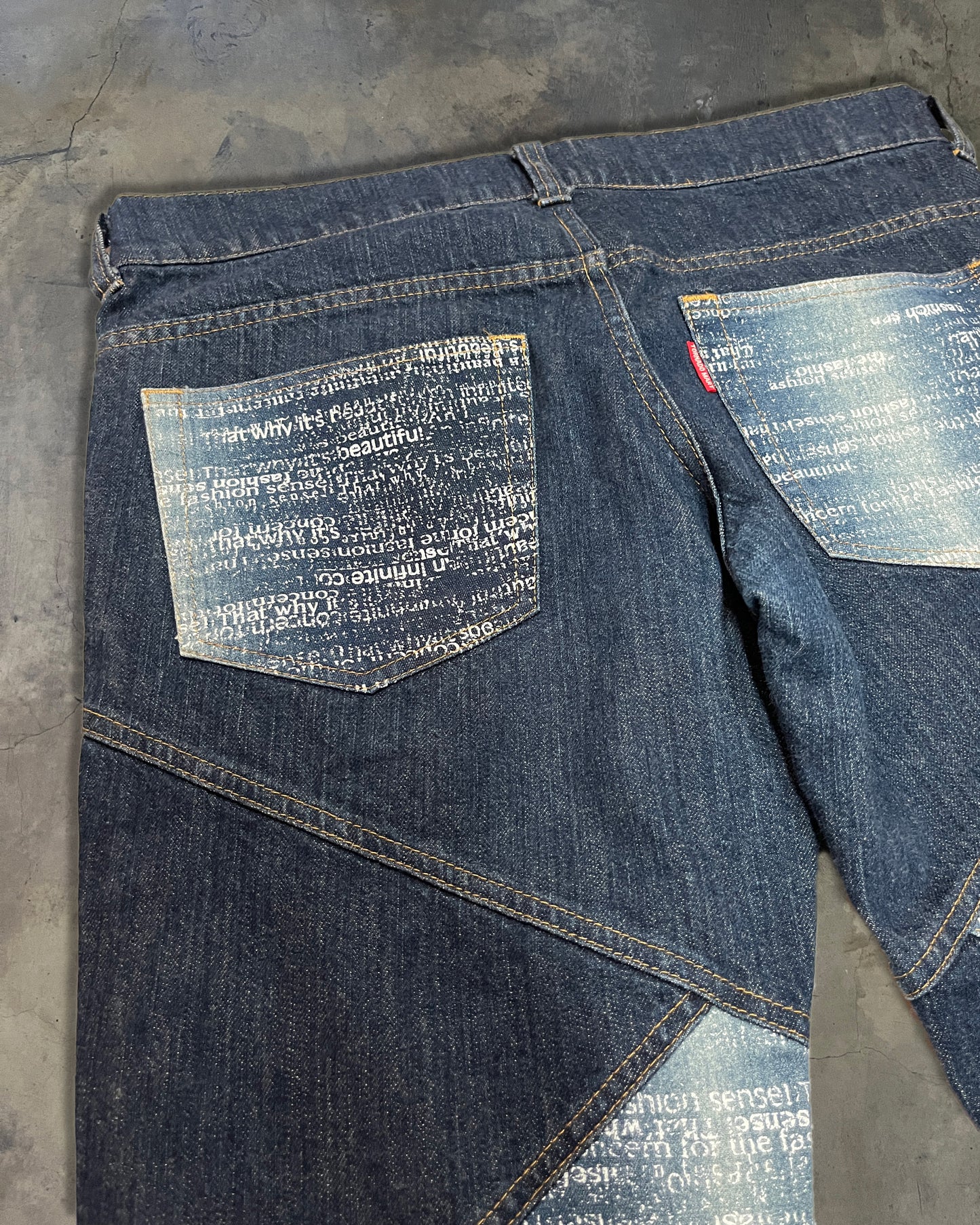 TORNADO MART PANELLED POEM JEANS