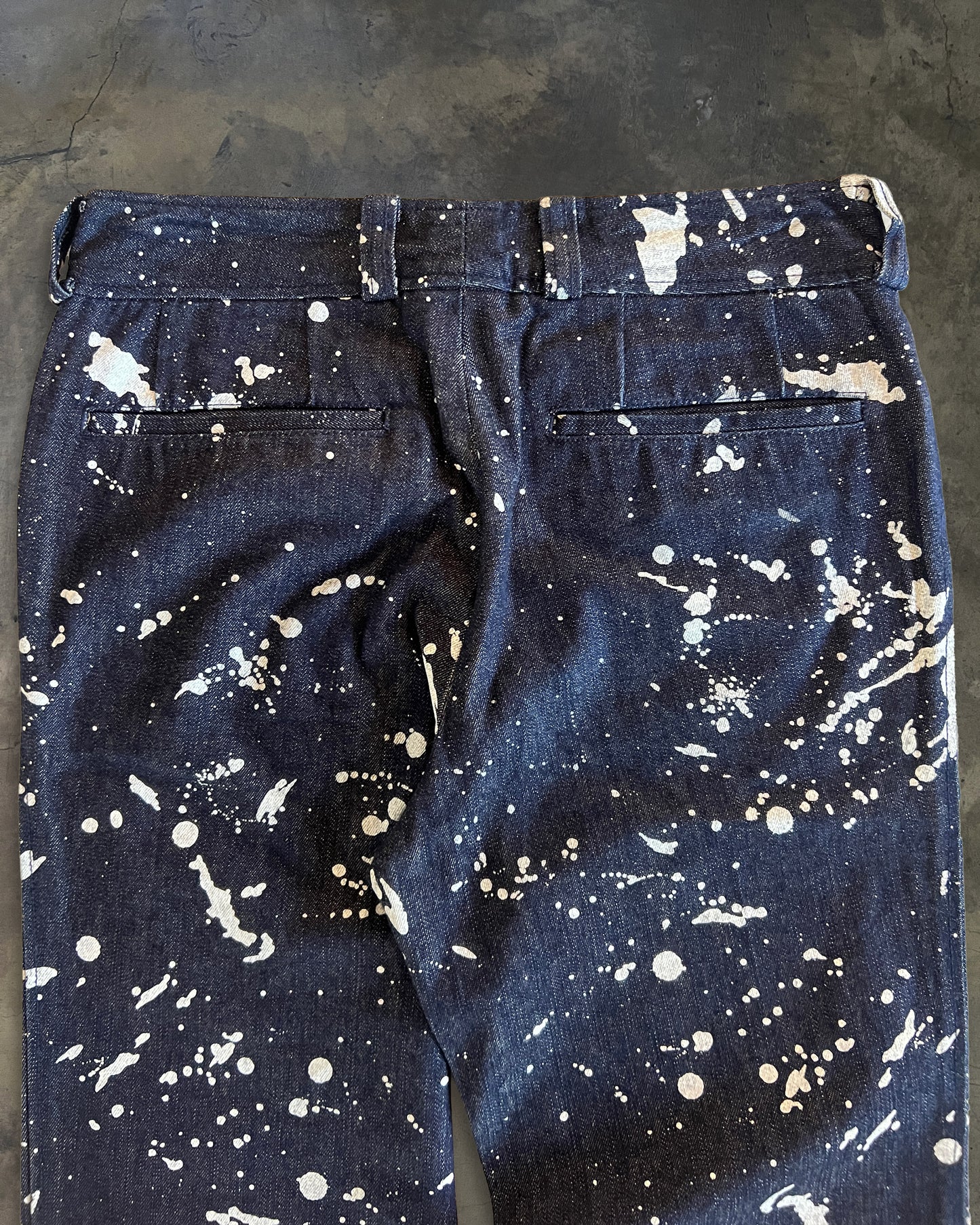 TORNADO MART SPLATTER BLEACH FLARED DENIM