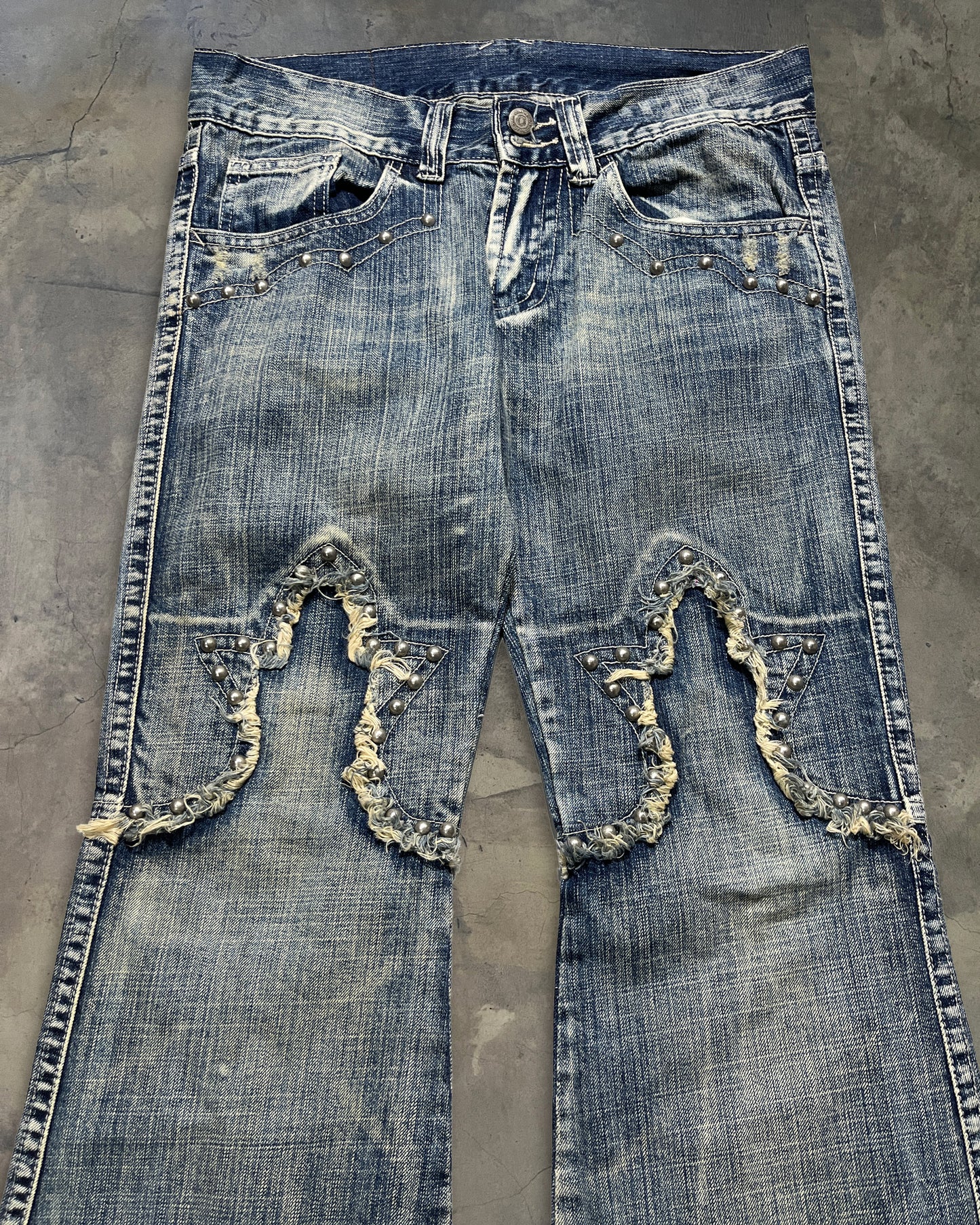 TORNADO MART STUDDED SWORD FLARED JEANS