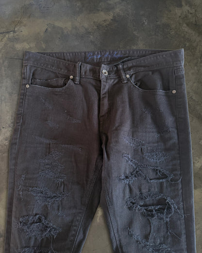 GOSTAR DE FUGA DISTRESSED SKINNY DENIM
