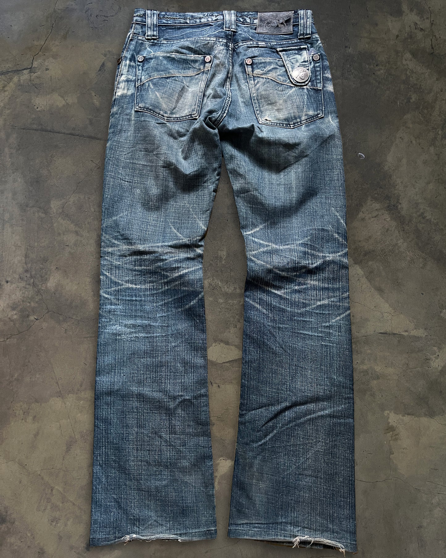 ROAR BOOT CUT WASHED DENIM