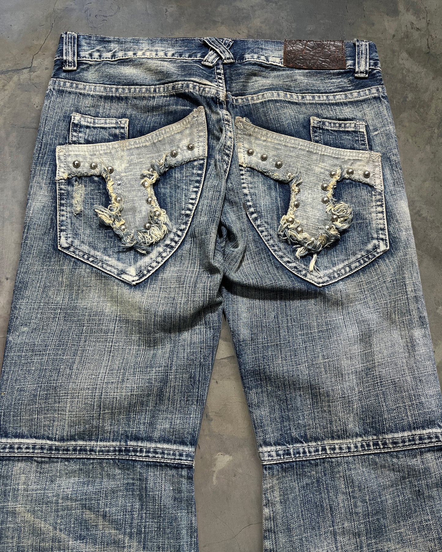 TORNADO MART STUDDED SWORD FLARED JEANS