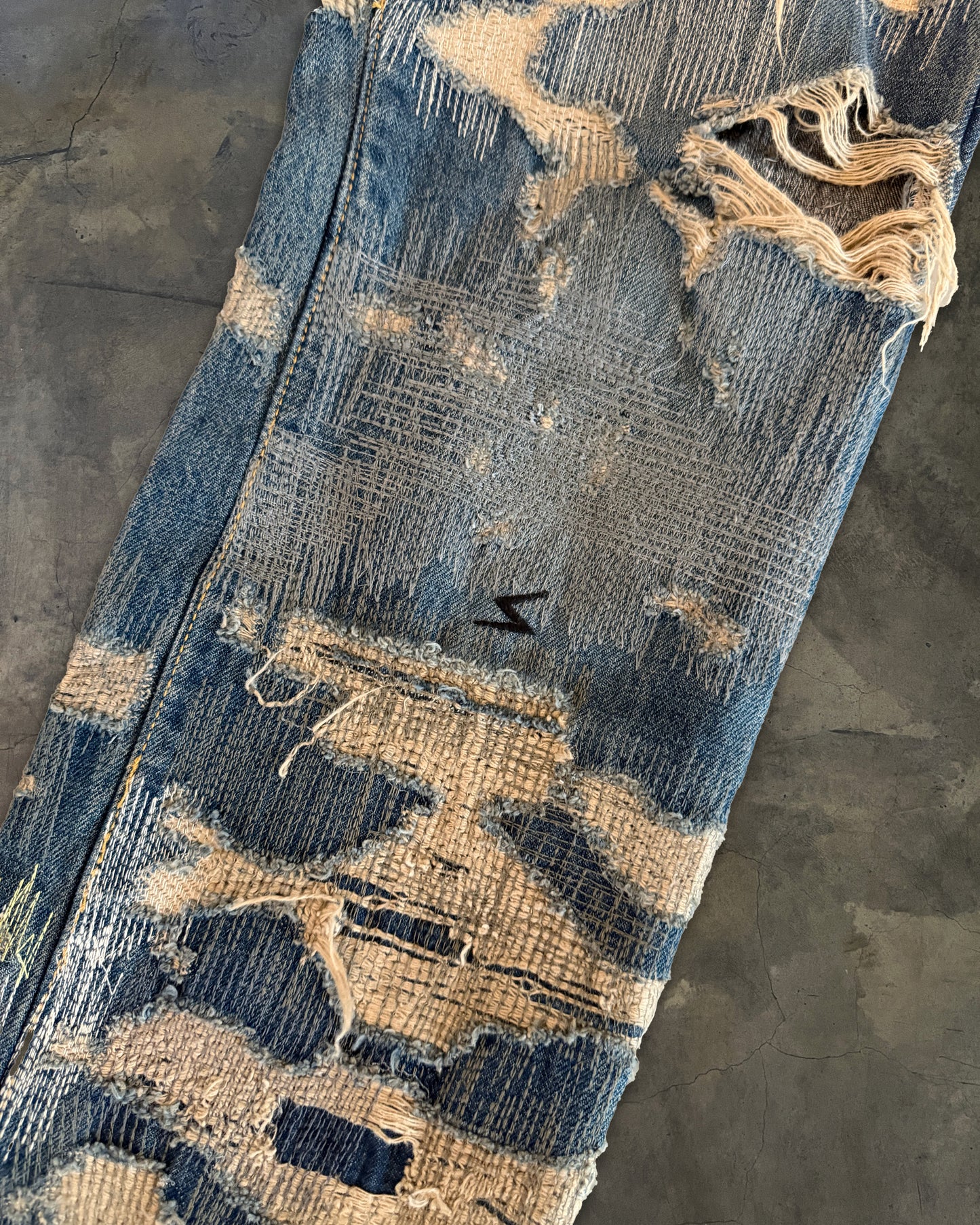 UNDERCOVER FW2005 RUNWAY 85 ARTS AND CRAFT JEANS