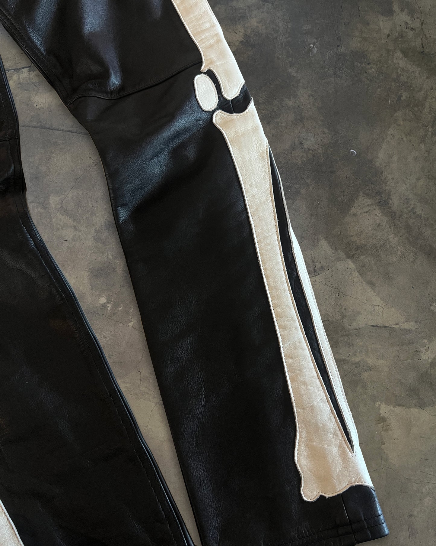 BLACKMEANS LEATHER BONE PANTS