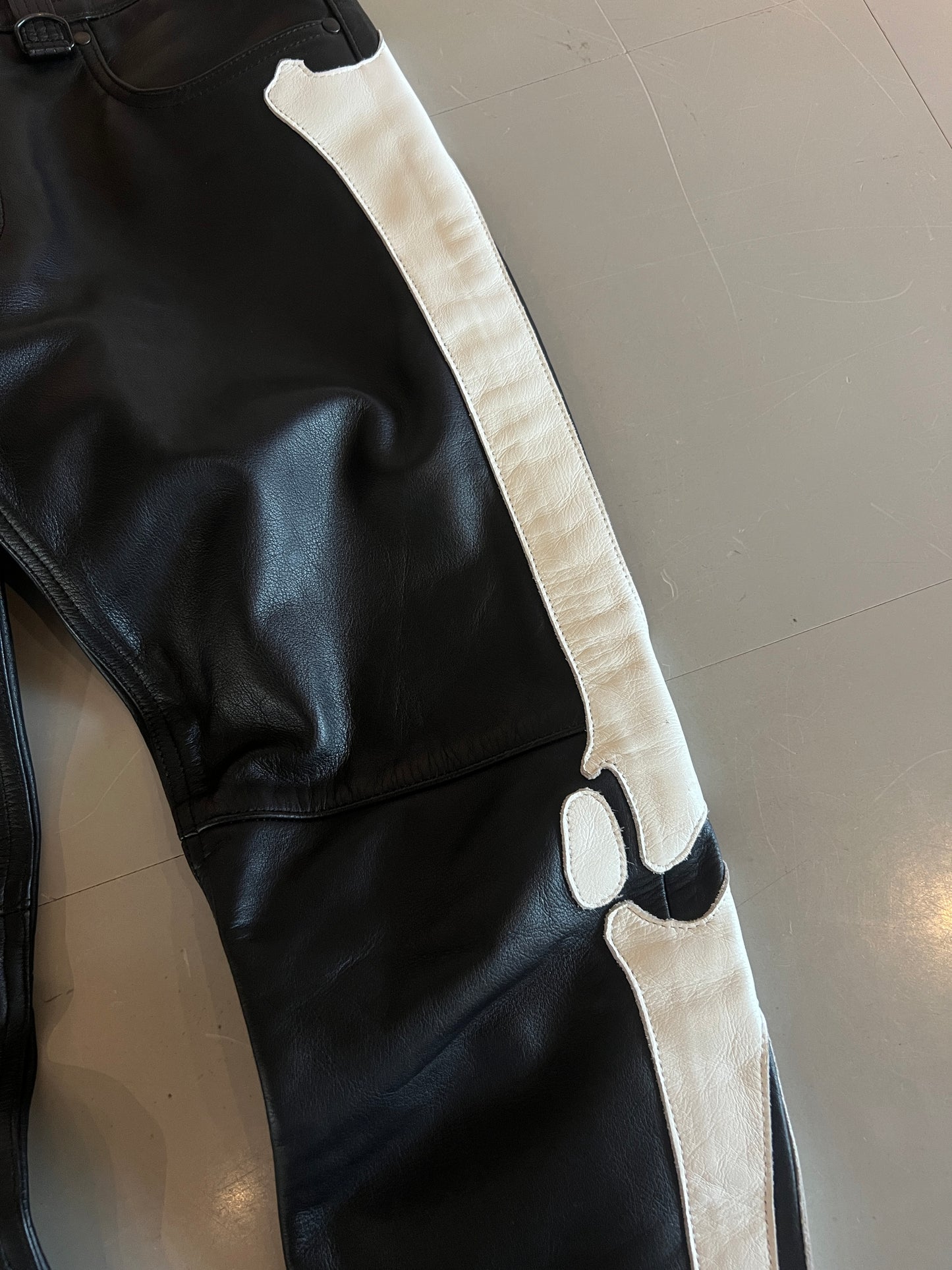 BLACKMEANS LEATHER BONE PANTS