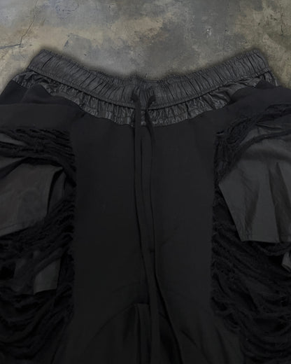 JULIUS SS2024 DESTROYED SWEATPANTS