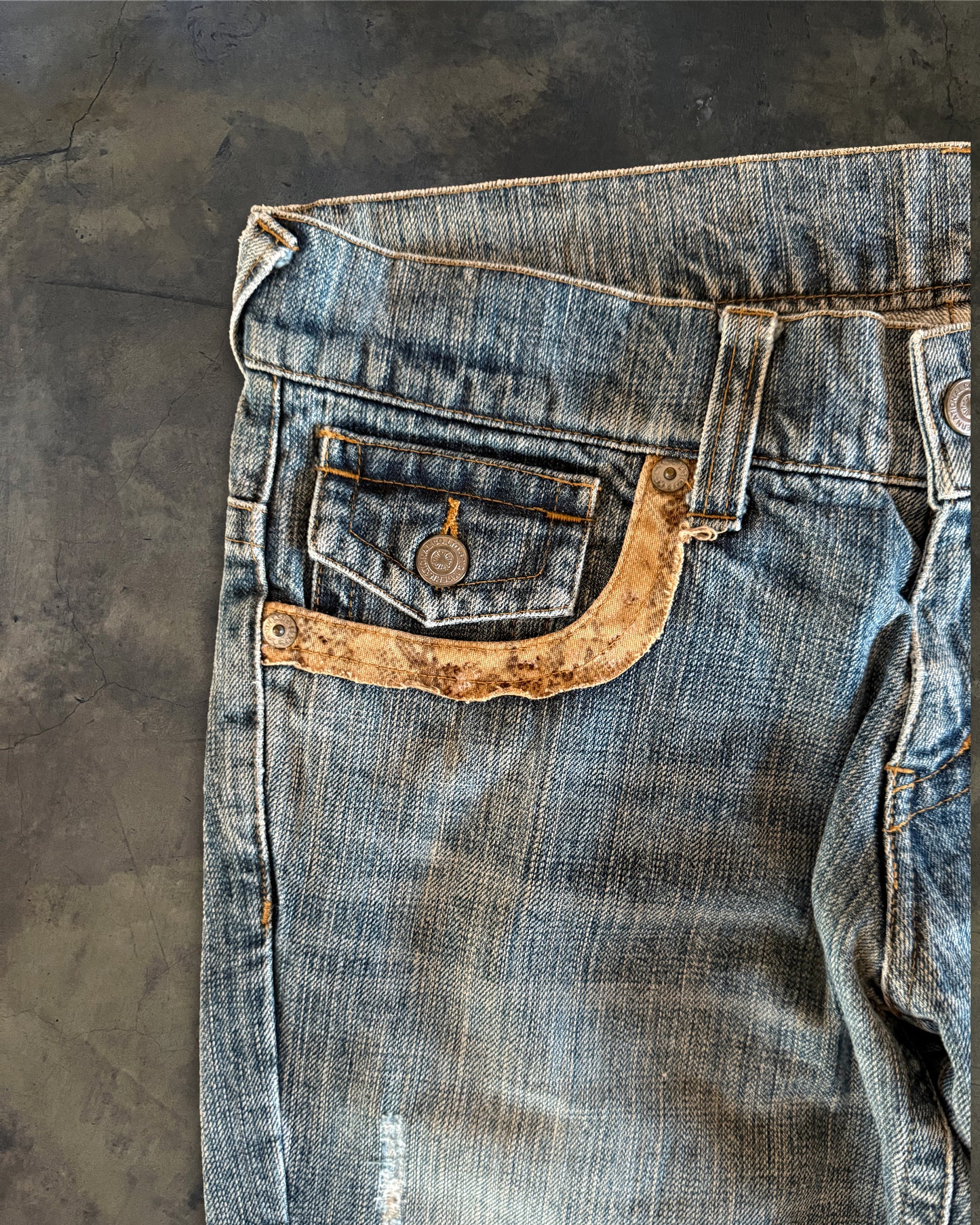 TORNADO MART SNAKE TRIM FLARED DENIM