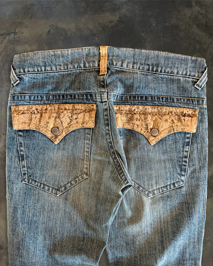 TORNADO MART SNAKE TRIM FLARED DENIM