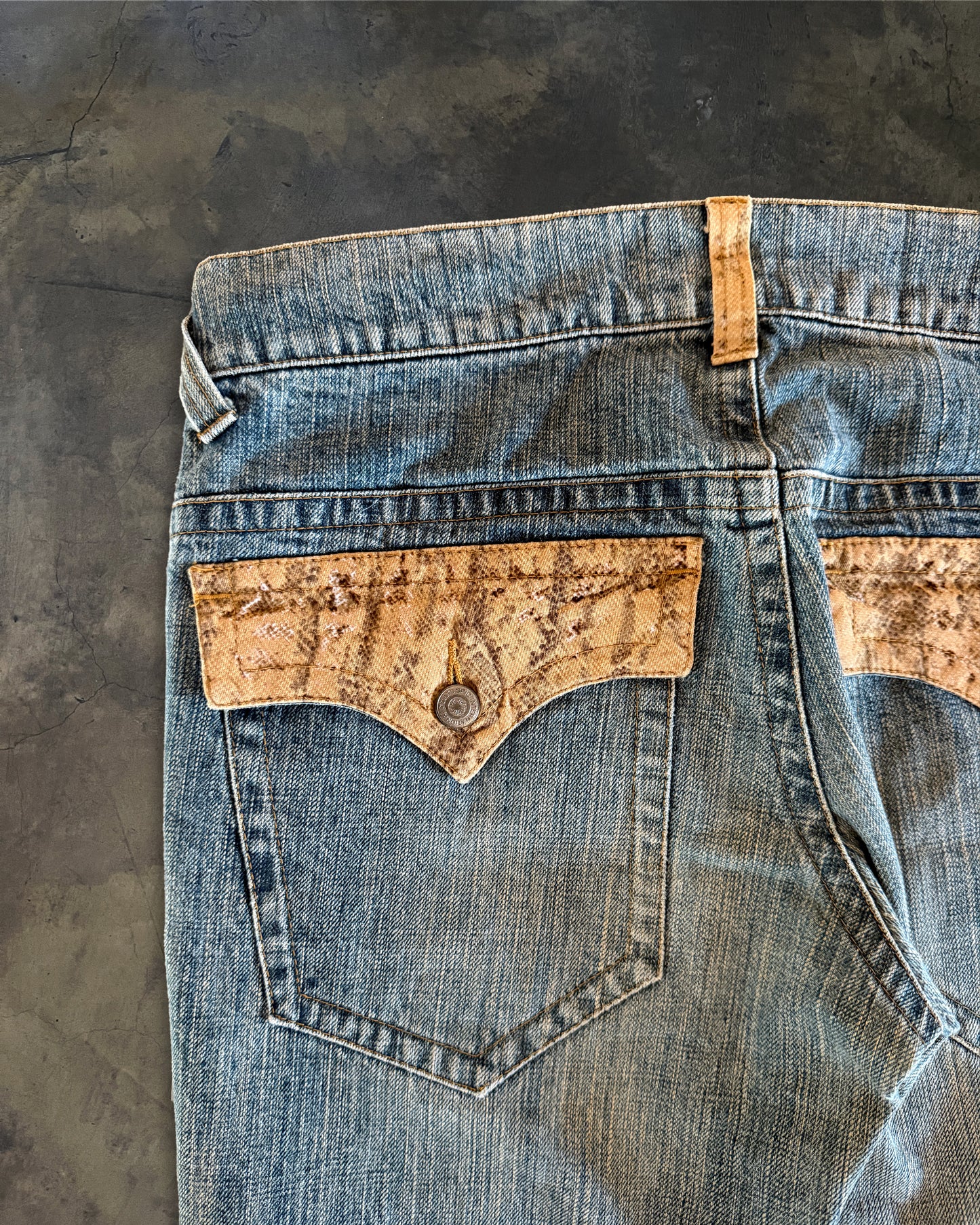 TORNADO MART SNAKE TRIM FLARED DENIM