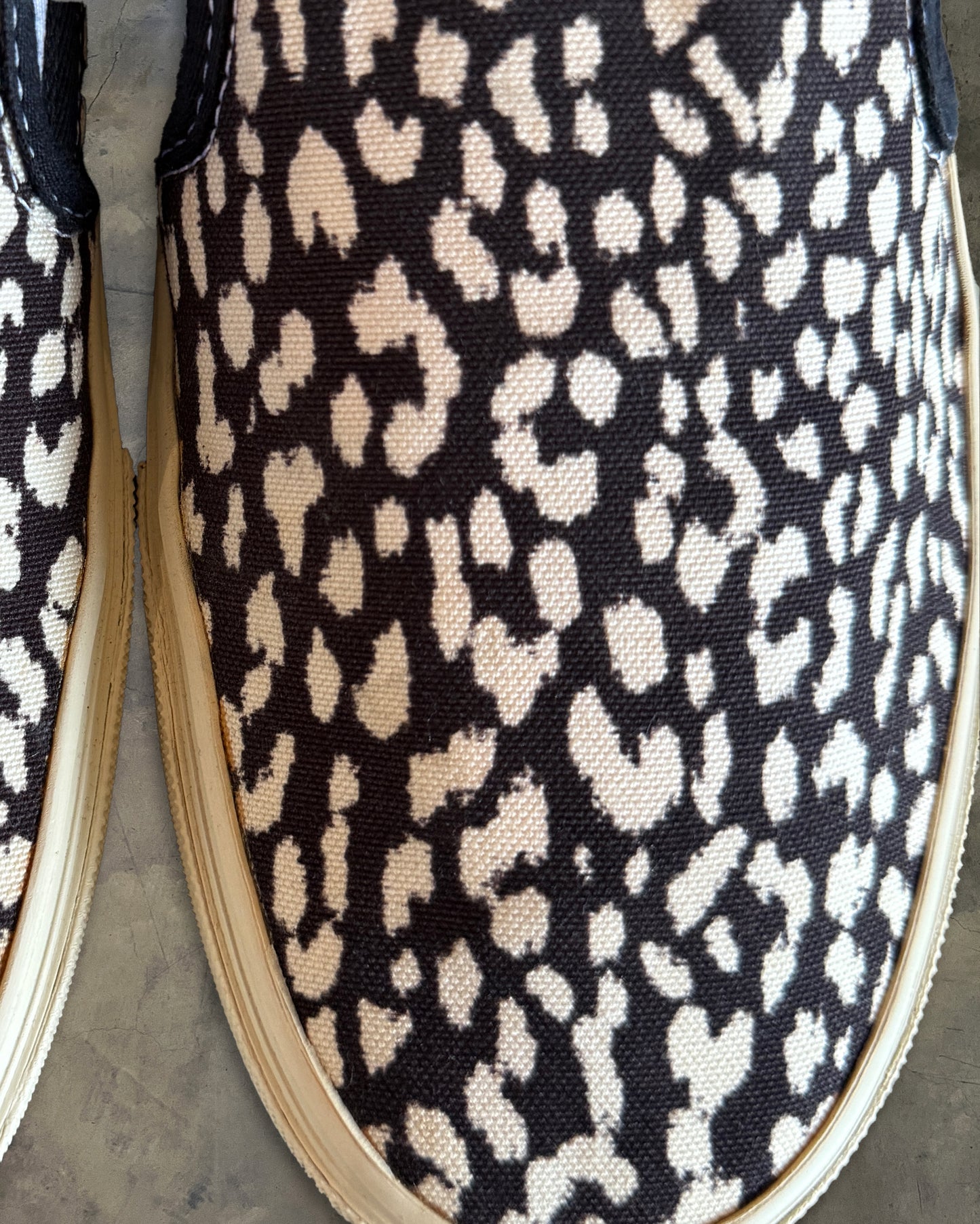 SAINT LAURENT ANIMAL PRINT SLIP-ONS