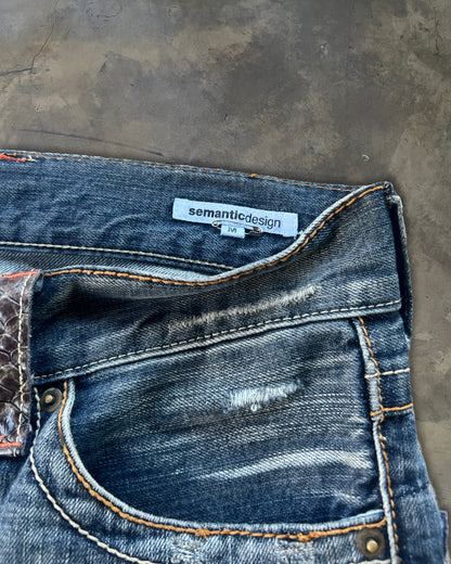 SEMANTIC DESIGN SNAKESKIN FLARE DENIM