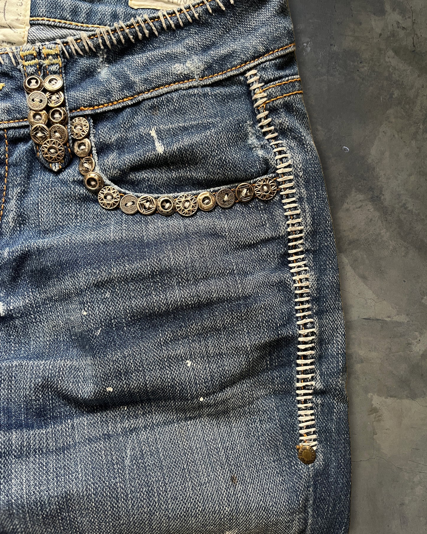 TAVERNITI SCAR STITCH METAL EMBELLISHED FLARE DENIM