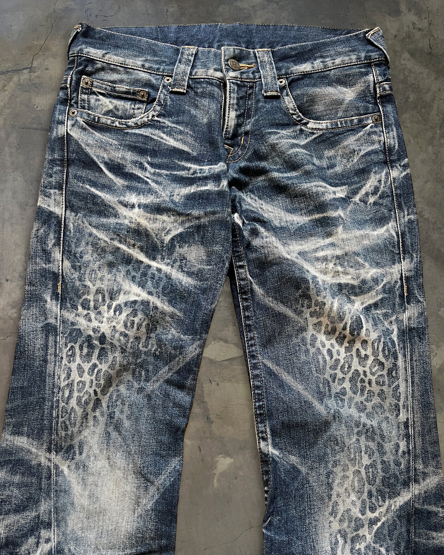 TORNADO MART CHEETAH PRINT FLARED DENIM