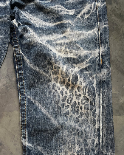 TORNADO MART CHEETAH PRINT FLARED DENIM