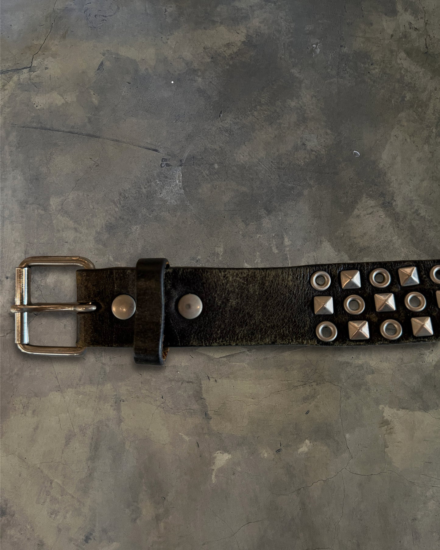 COMME DES GARCONS STUDDED EYELET BELT