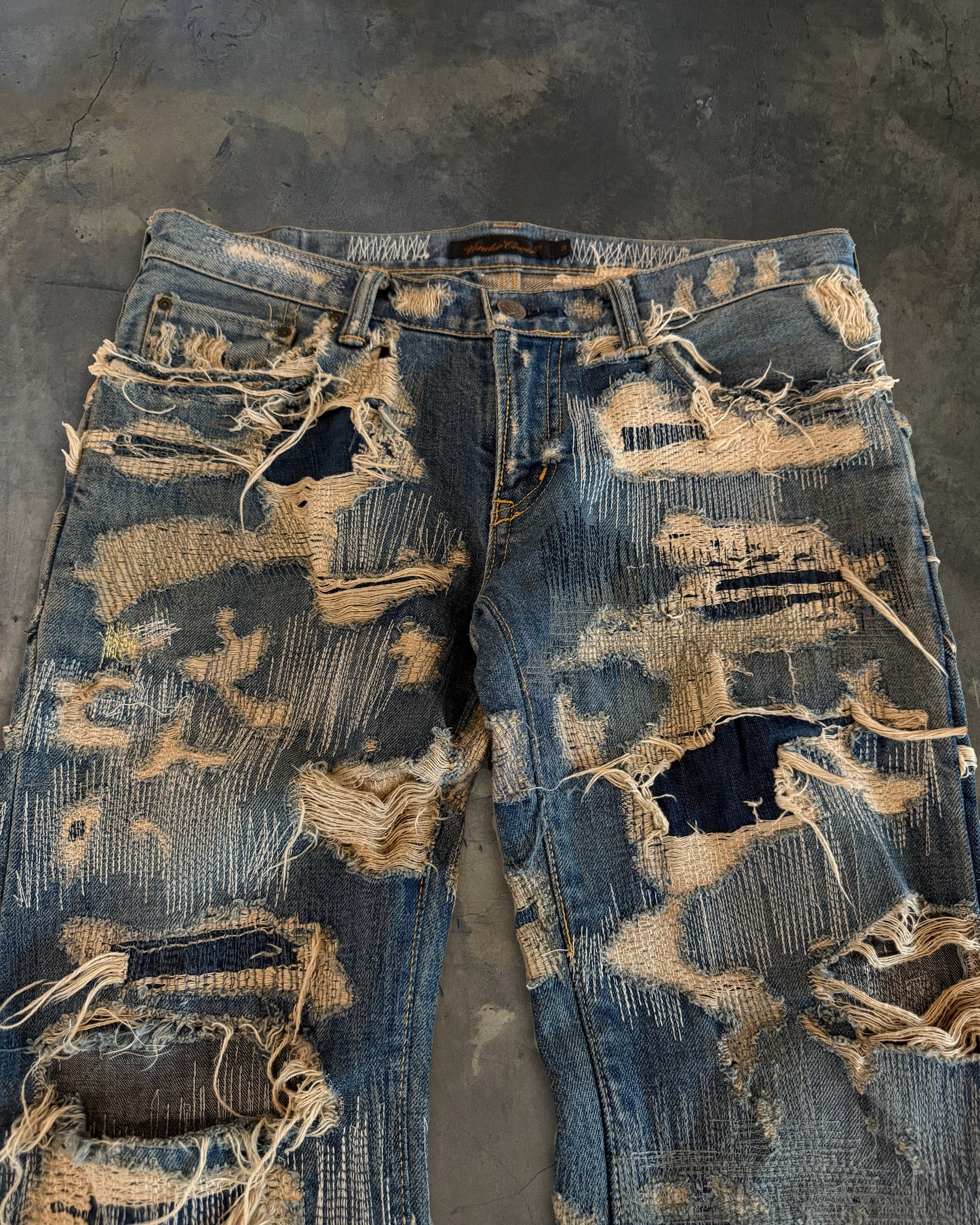 UNDERCOVER FW2005 RUNWAY 85 ARTS AND CRAFT JEANS